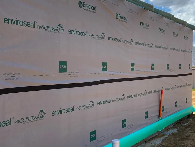 New house frame covered in Bradford Enviroseal ProctorWrap wall wrap