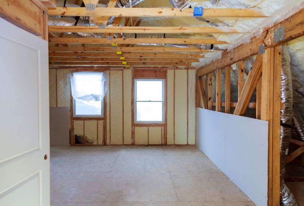 Wall and roof Insulation Beechworth Room under construction with spray foam insulation in the walls and ceiling